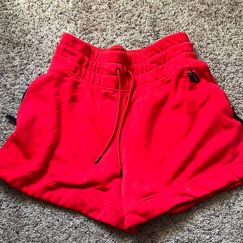 Red Nike shorts
